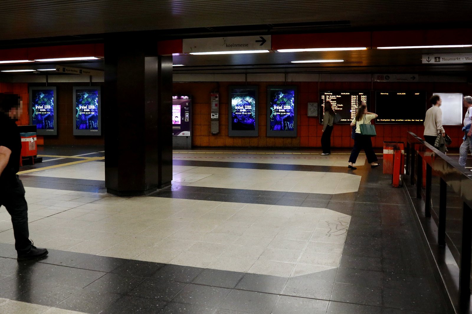 IEM Cologne digital screens across the Deutz station concourse