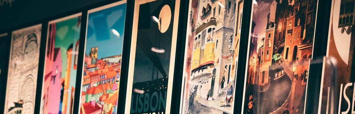 Rows of framed poster prints on display